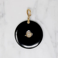 Inky Black Onyx Pendant with Gold Details