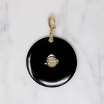 Inky Black Onyx Pendant with Gold Details