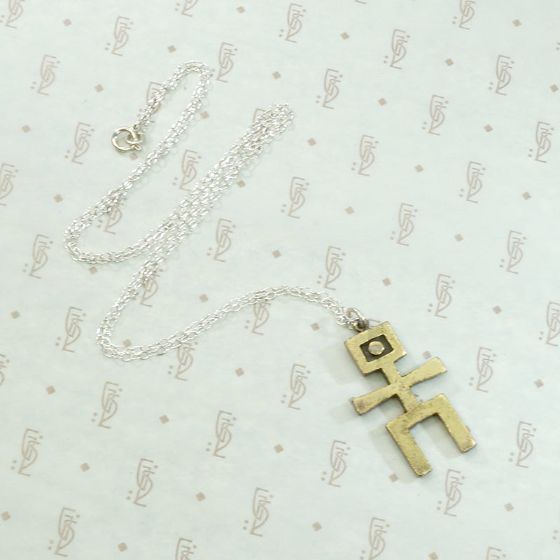 Brutalist Figural Pendant in Gold on Silver