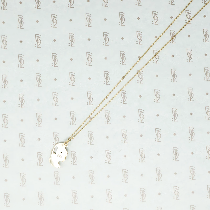 14k joan of arc in helment pendant back
