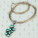 liquid silver necklace with kingman turquoise pendant