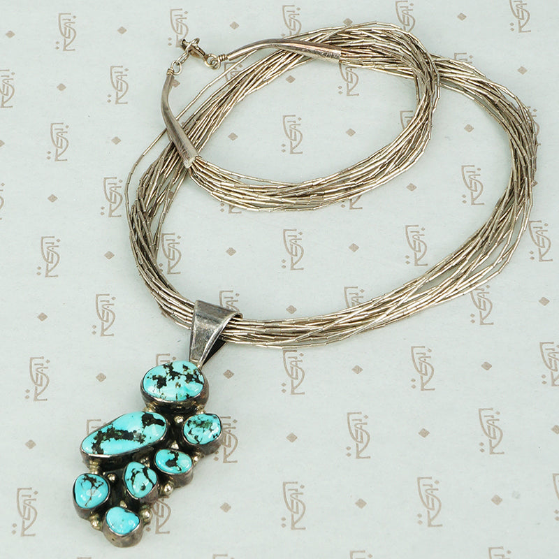 liquid silver necklace with kingman turquoise pendant