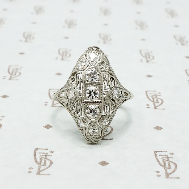 art deco platinum knuckle ring with diamonds