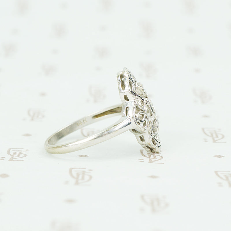 14k white gold and diamond knuckle ring side view