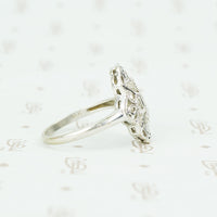 14k white gold and diamond knuckle ring side view