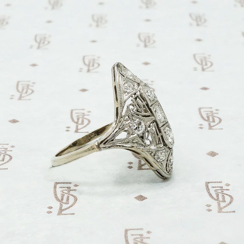 art deco platinum knuckle ring with diamonds side views