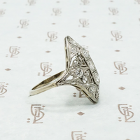 art deco platinum knuckle ring with diamonds side views