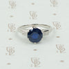 Intense Sapphire and Baguette Platinum Engagement Ring