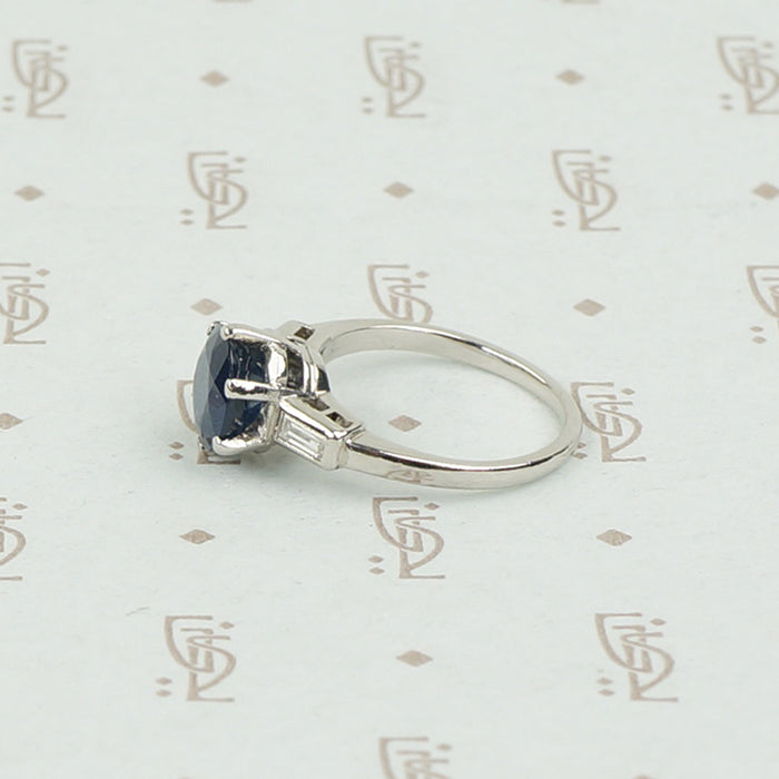 Intense Sapphire and Baguette Platinum Engagement Ring
