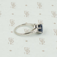 Intense Sapphire and Baguette Platinum Engagement Ring