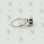 Intense Sapphire and Baguette Platinum Engagement Ring