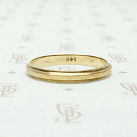 Elegantly Sculpted Gold Wedding Band