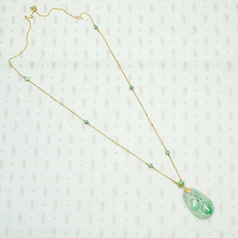 Carved Jade Plum Pendant on Decorative Gold Chain