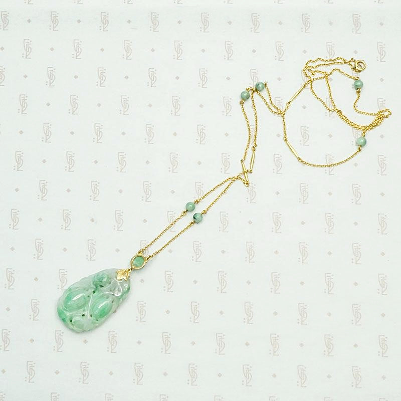 Carved Jade Plum Pendant on Decorative Gold Chain