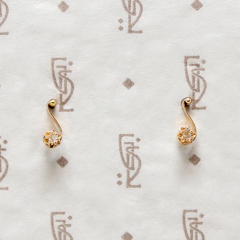 Delicate Diamond-Set Musical Note Studs