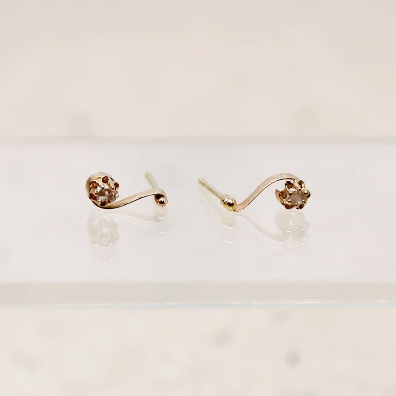 Delicate Diamond-Set Musical Note Studs