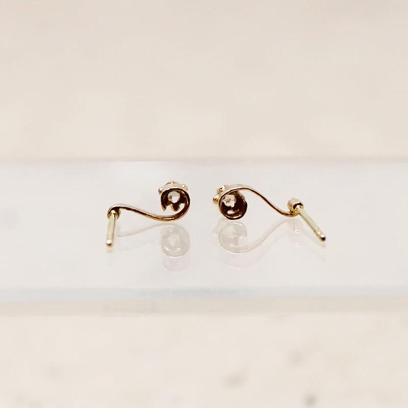 Delicate Diamond-Set Musical Note Studs