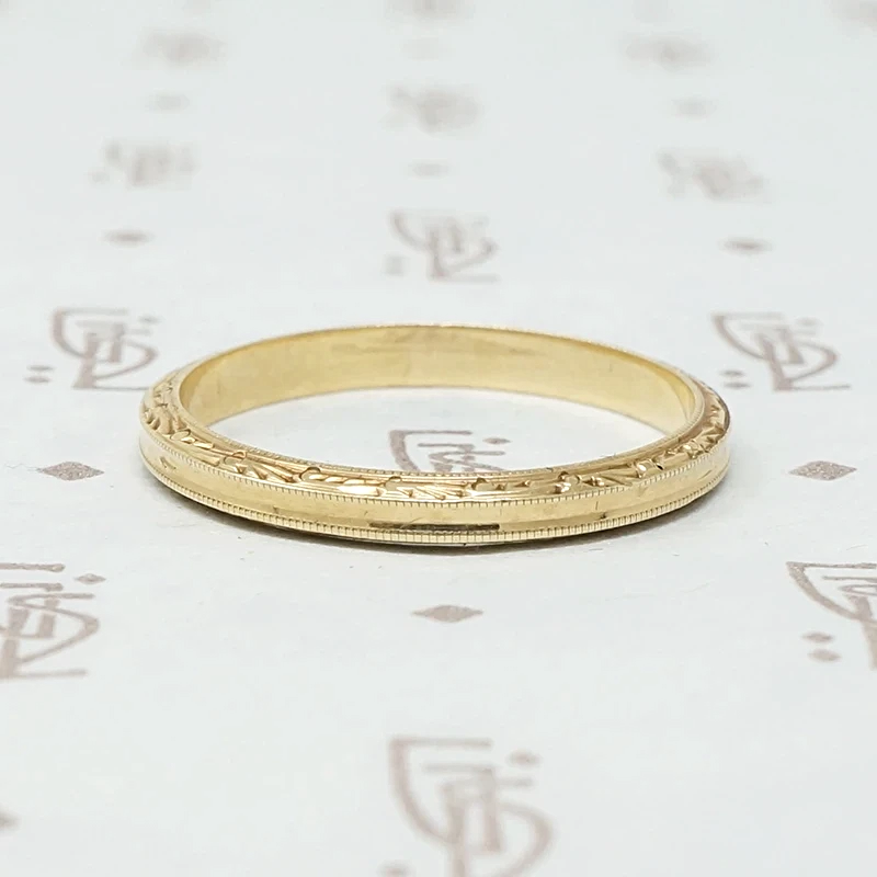 Slim and Elegant Engraved Gold Band