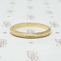 Slim and Elegant Engraved Gold Band