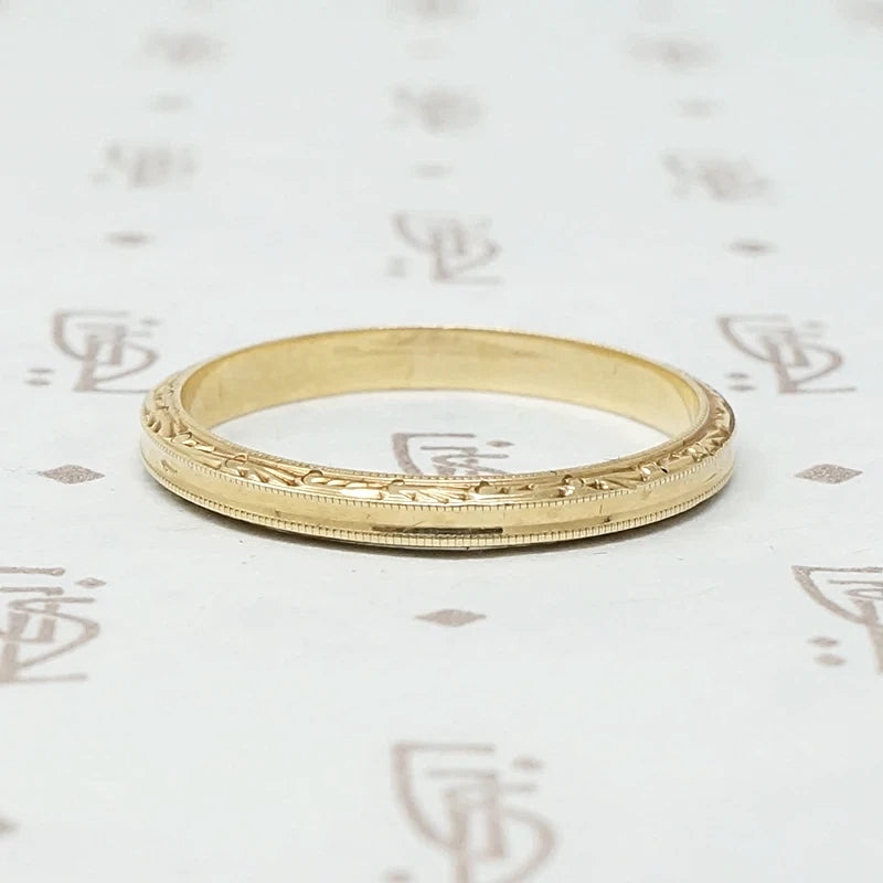 Slim and Elegant Engraved Gold Band