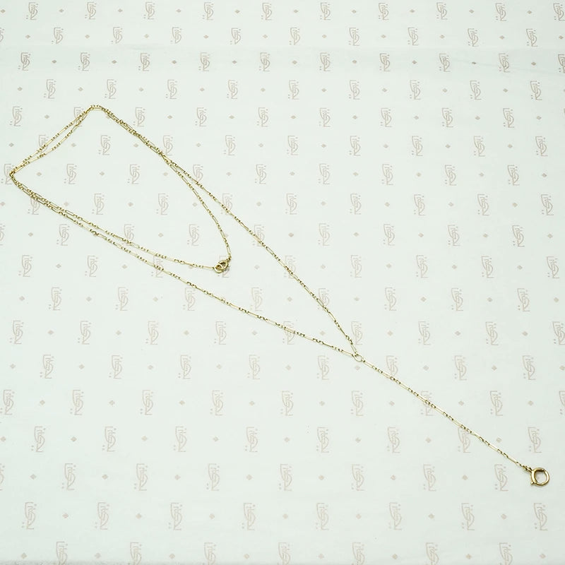 14k yellow gold y chain. vintage