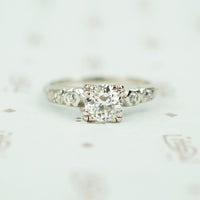 1940's old european cut diamond engagement ring set with a .72ct VS1 F/G Diamond triple split prongs ging the round diamond a square look