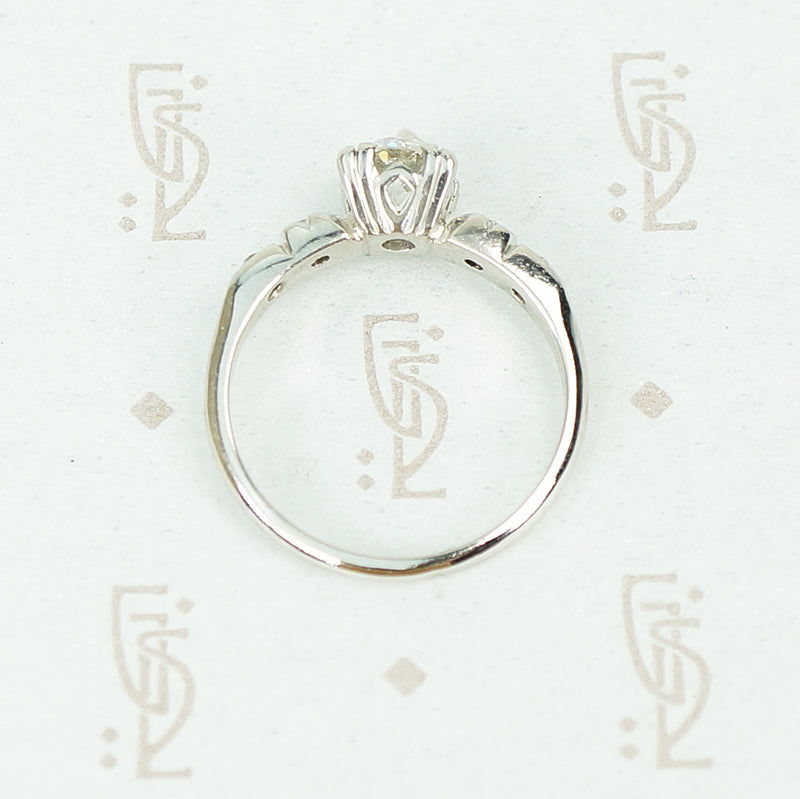 flat side view of 1940's platinum and oec diamond engagement ring