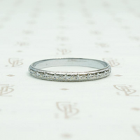 Zigzag and Flowers Otsby Barton White Gold Band, profile view.