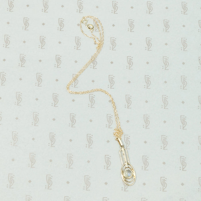 Limpid Moonstone Arts & Crafts Pendant in Gold