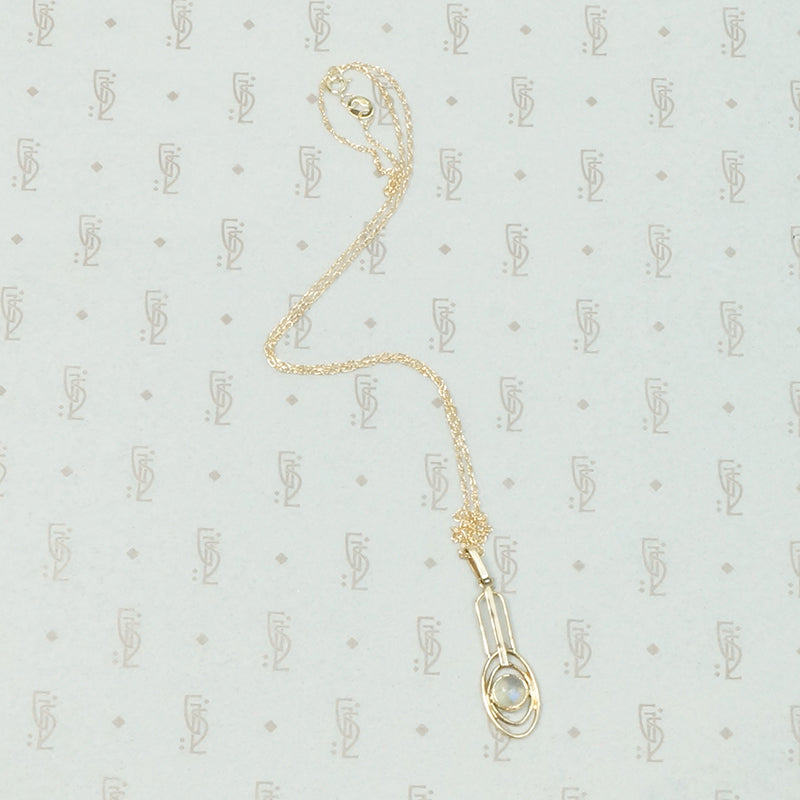 Limpid Moonstone Arts & Crafts Pendant in Gold