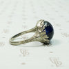 Magical Cabochon Sapphire in Crisp Floral Setting
