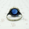 Magical Cabochon Sapphire in Crisp Floral Setting