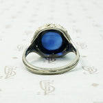 Magical Cabochon Sapphire in Crisp Floral Setting