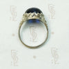 Magical Cabochon Sapphire in Crisp Floral Setting