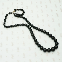 Graduated Black Matte Glass Beads with Gold Fittings