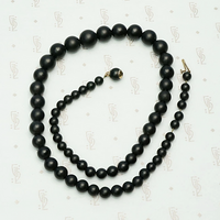 Graduated Black Matte Glass Beads with Gold Fittings