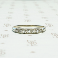 Seven Diamond White Gold Wedding Band