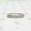 Seven Diamond White Gold Wedding Band