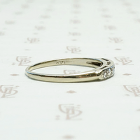 Seven Diamond White Gold Wedding Band