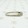Seven Diamond White Gold Wedding Band