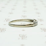 Seven Diamond White Gold Wedding Band