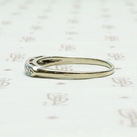 Seven Diamond White Gold Wedding Band