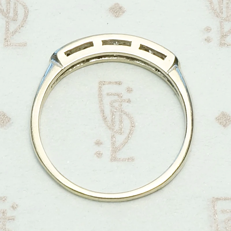 Seven Diamond White Gold Wedding Band