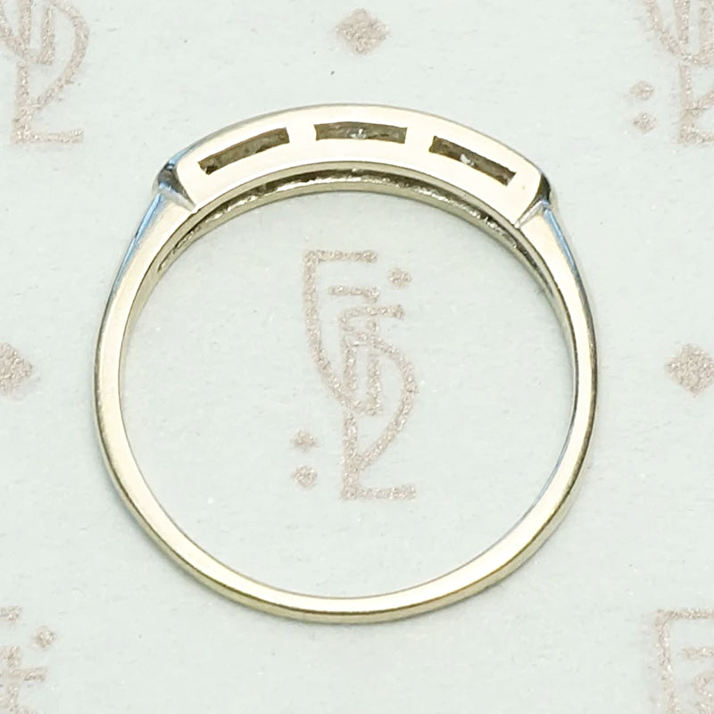 Seven Diamond White Gold Wedding Band