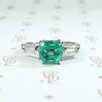 Spring Green Emerald & Baguette Ring in Platinum