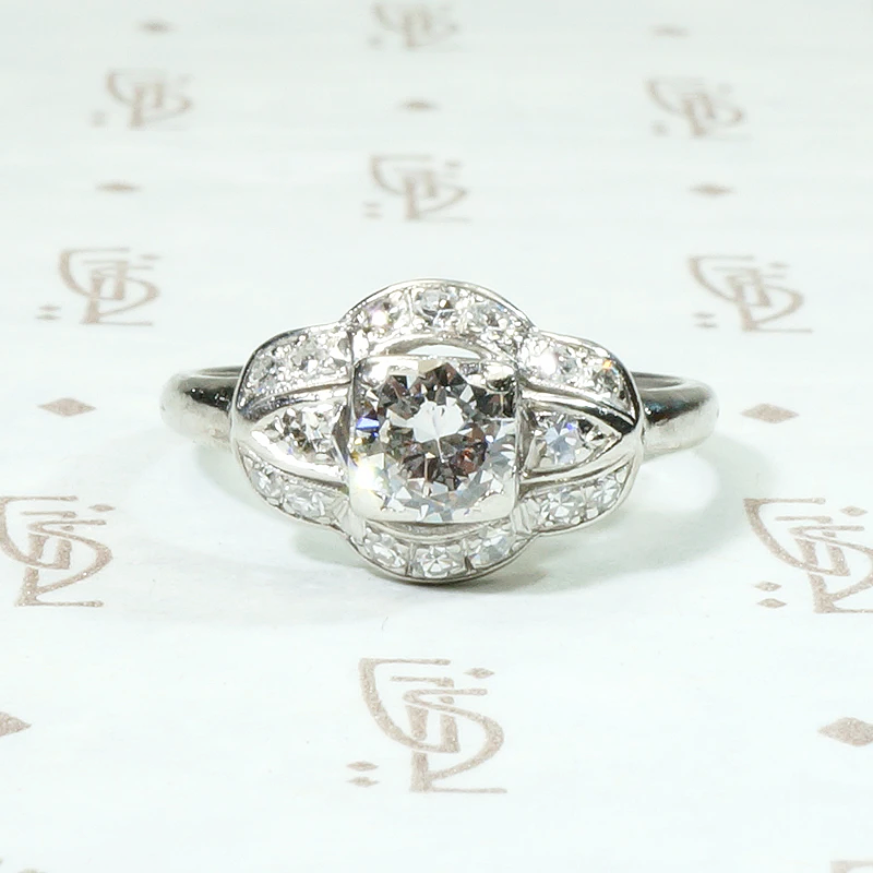 Art Deco Diamond Ring with Graceful Platinum Curves
