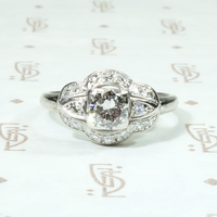 Art Deco Diamond Ring with Graceful Platinum Curves
