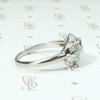 Art Deco Diamond Ring with Graceful Platinum Curves