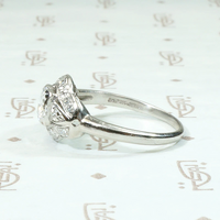 Art Deco Diamond Ring with Graceful Platinum Curves