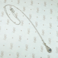 Lacy Engraved White Gold Teardrop Sapphire Pendant